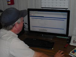 Ww 0801 Mueller Cimg0581 Utility Worker Looking At The Interface Of The Ami System On His Computer Screen Sm Ww 0801 Mueller Cimg0581 Utility Worker Looking At The Interface Of The Ami System On His Computer Screen Sm