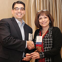 Outgoing Chairman Frank Rebori (Smith & Loveless, Inc.) passes the gavel to WWEMA 2016 Chairman Tammy Bernier (Duperon Corporation). Outgoing Chairman Frank Rebori (Smith & Loveless, Inc.) passes the gavel to WWEMA 2016 Chairman Tammy Bernier (Duperon Corporation).