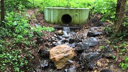 Stormwater runoff draining from a detention pond after a rain storm in Arlington, Virginia. Stormwater runoff draining from a detention pond after a rain storm in Arlington, Virginia.