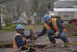 American Water workers. Courtesy: American Water. American Water workers. Courtesy: American Water.