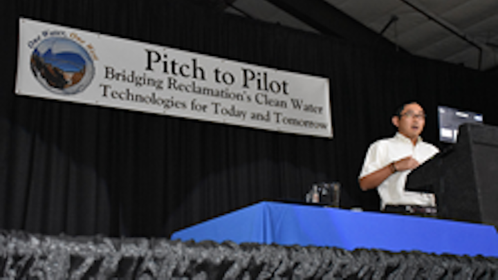 Keisuke Ikehata of Pacific Advanced Civil Engineering, pitches to the public their project Development of Novel Photobiological Process to Improve Water Recovery in Brackish Groundwater Desalination