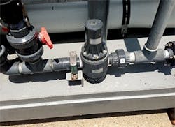 A pressure regulator in a highly corrosive water treatment system. The PVC is impervious to the chemicals being used. A pressure regulator in a highly corrosive water treatment system. The PVC is impervious to the chemicals being used.