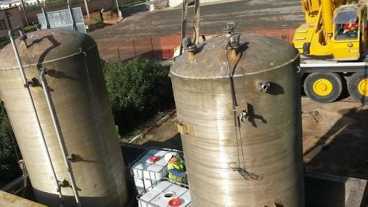 Biwater team removing chemical storage tank.