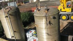 Biwater team removing chemical storage tank. Biwater team removing chemical storage tank.