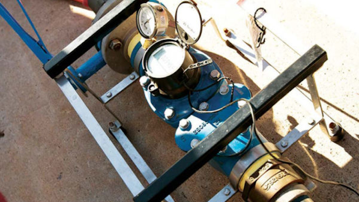 The portable OMNI Verification (V2) portable test meter is placed in-line to check the accuracy and performance of large, commercial meters without interrupting service.
