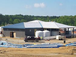 Exterior containment walls on the chemical storage building were formed and poured using treated concrete. Exterior containment walls on the chemical storage building were formed and poured using treated concrete.