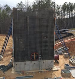 Extensive steel reinforcement is installed prior to pouring the walls of the clear well splitter box. The splitter box is designed to allow an equal flow split between two 6.3-million-&shy;gallon clear wells, one of which has already been constructed. The structure was poured using concrete mixed with Xypex Admix C-500.