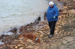 Sussey searches along Shamokin Creek in Shamokin, Pa. This creek has been impacted by both acid mine drainage and CSO events. Sussey searches along Shamokin Creek in Shamokin, Pa. This creek has been impacted by both acid mine drainage and CSO events.