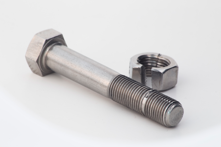 A standard galled bolt with removed nut.