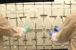 Scientists conduct water quality tests at NSF International, headquartered in Ann Arbor, Mich. Scientists conduct water quality tests at NSF International, headquartered in Ann Arbor, Mich.
