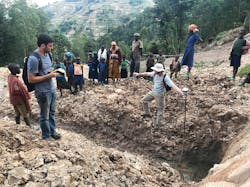 Auburn University students built a spring box and pipeline to catch water from a groundwater spring and pipe it to the Kabaya Technical Secondary School (KTSS) in Rwanda for cooking and drinking.