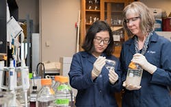 University of Delaware Professor Kathryn Coyne (right) and doctoral student Yanfei Wang have patented a technique for embedding algicide-emitting Shewanella bacteria into gel beads. These “bacteria bullets” can then be placed in mesh bags for deployment to coastal waters to stop a toxic red tide bloom. University of Delaware Professor Kathryn Coyne (right) and doctoral student Yanfei Wang have patented a technique for embedding algicide-emitting Shewanella bacteria into gel beads. These “bacteria bullets” can then be placed in mesh bags for deployment to coastal waters to stop a toxic red tide bloom.