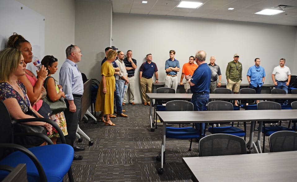 Lead Chemist, Eric Stark, introducing the educational classroom at Denso North America where training on application and corrosion prevention methods will take place.