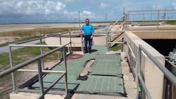 Charles F. Ortiz, P.E., district engineer in charge at the Laguna Madre Water District, stands at one of the Texas sites where the Anue geomembranes are used.