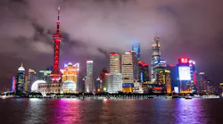Lighted Buildings During Nighttime Near Body Of Water 2227942