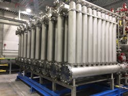 Butte’s Aqua MultiBore® C-Series ceramic membrane system consists of four trains, each with 100 modules arranged in ten 10-module rows. Butte’s Aqua MultiBore® C-Series ceramic membrane system consists of four trains, each with 100 modules arranged in ten 10-module rows.