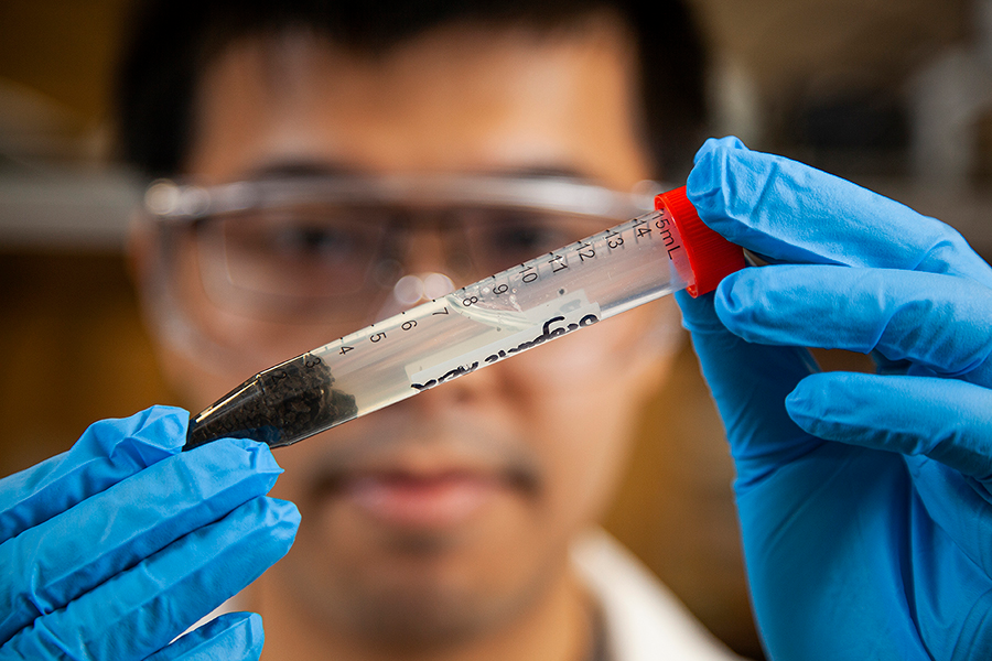 FAMU-FSU College of Engineering research assistant Runwei Li looks over the separation of waste solids in professor Gang Chen&rsquo;s lab at the Aero-Propulsion, Mechatronics, and Energy (AME) building in Tallahassee, Florida.