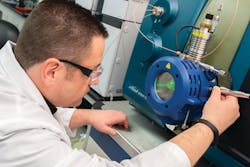 Battelle Norwell Laboratory Director Jonathan Thorn optimizes instrumentation prior to PFAS analysis. Battelle Norwell Laboratory Director Jonathan Thorn optimizes instrumentation prior to PFAS analysis.