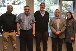 Environmental Studies Professor Brent Haddad, center, is pictured with representatives from American University in Cairo and Alexandria University.