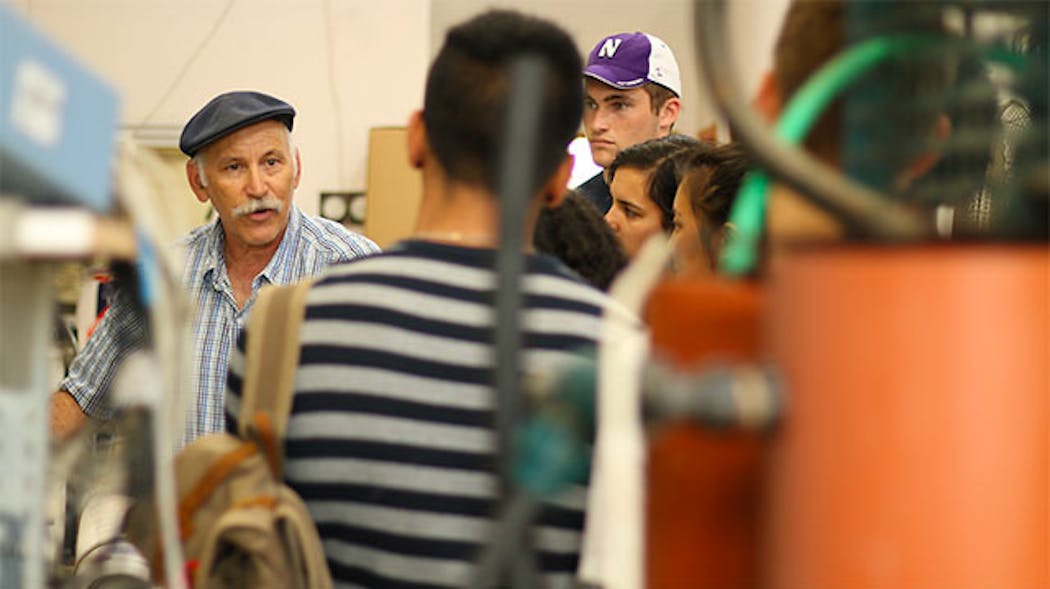 Jack Gilron (in grey hat) gives Northwestern students a tour of a desalination lab in Israel.