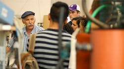 Jack Gilron (in grey hat) gives Northwestern students a tour of a desalination lab in Israel. Jack Gilron (in grey hat) gives Northwestern students a tour of a desalination lab in Israel.