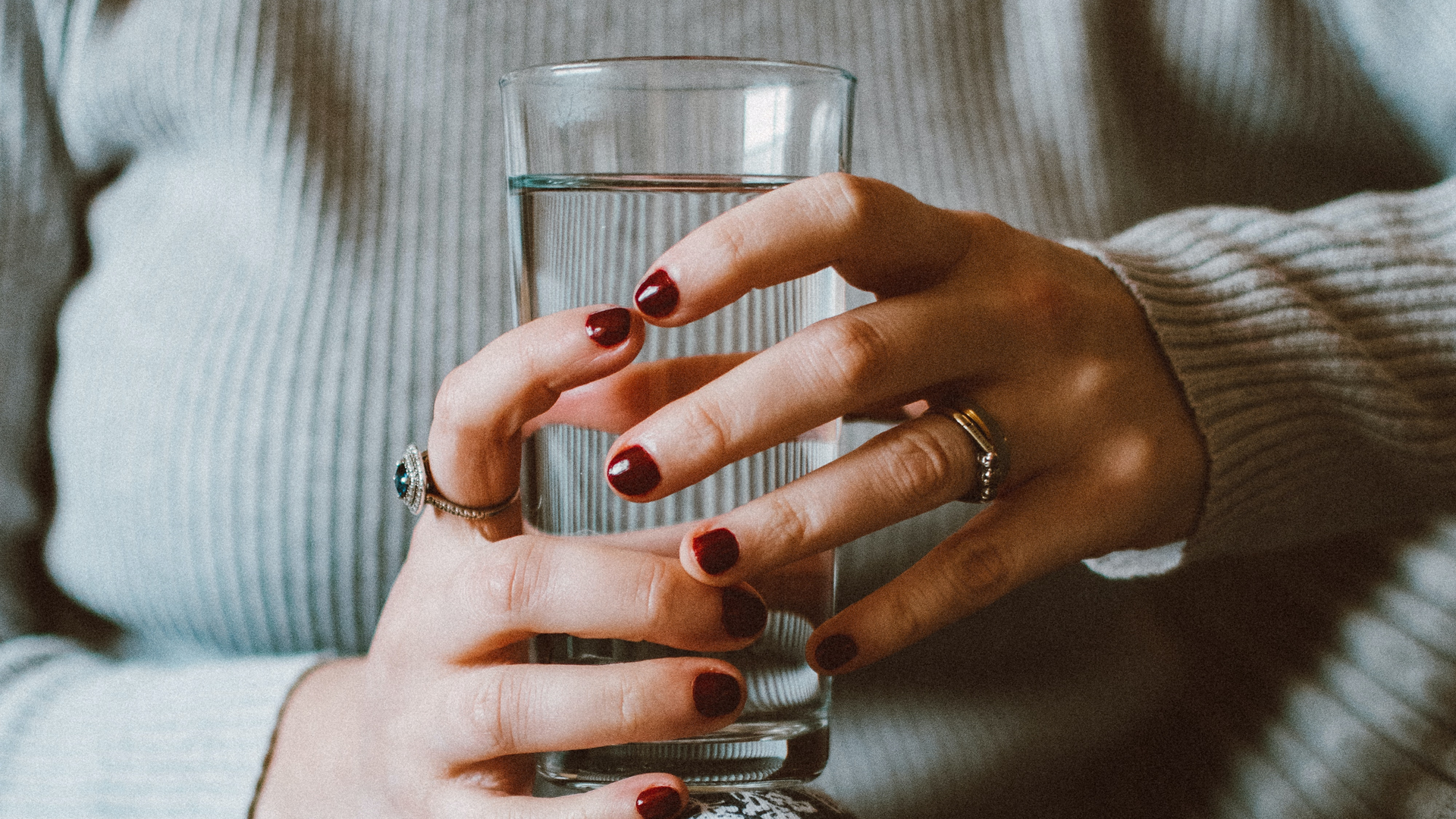 Person Sitting On Grey Sofa While Holding Clear Highball 1785864 5ed959ec46de2