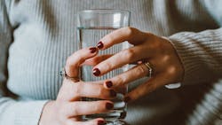 Person Sitting On Grey Sofa While Holding Clear Highball 1785864 5ed959ec46de2 Person Sitting On Grey Sofa While Holding Clear Highball 1785864 5ed959ec46de2