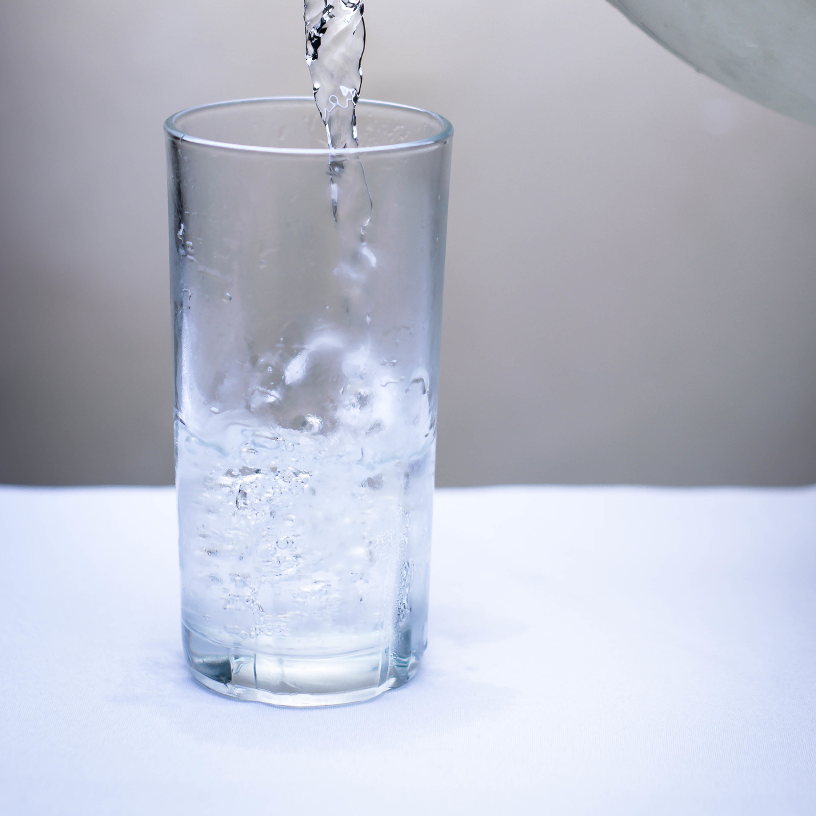 Clear Glass Pitcher Pouring Water On Clear Drinking Glass 3500006 5f106e70e4f02