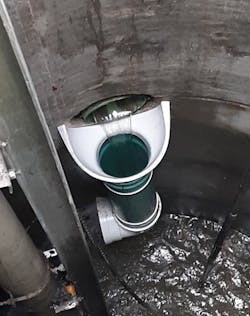 A fiberglass drop bowl is bolted to the manhole wall just beneath the high-level inflow pipe. A fiberglass drop bowl is bolted to the manhole wall just beneath the high-level inflow pipe.