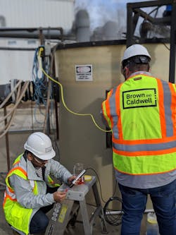 Brown and Caldwell staff calibrate a smart sensor station for an industrial user. Brown and Caldwell staff calibrate a smart sensor station for an industrial user.