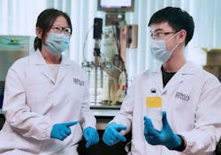 The team led by Associate Professor He Jianzhong (left) and Research Fellow Dr Wang Qingkun (right) discovered Thauera sp. strain SND5 after they isolated and tested various strains of bacteria from wastewater samples. Dr Wang holding a wastewater sample containing the unique SND5 bacterium. The team led by Associate Professor He Jianzhong (left) and Research Fellow Dr Wang Qingkun (right) discovered Thauera sp. strain SND5 after they isolated and tested various strains of bacteria from wastewater samples. Dr Wang holding a wastewater sample containing the unique SND5 bacterium.