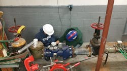 Olea Edge Analytics crew workers in New Jersey working on a water meter installation. Olea Edge Analytics crew workers in New Jersey working on a water meter installation.