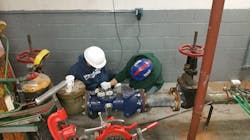 Olea Edge Analytics crew workers in New Jersey working on a water meter installation. Olea Edge Analytics crew workers in New Jersey working on a water meter installation.