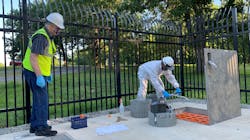 Troy R. Henderson Sr., Louisville/Jefferson County Metropolitan Sewer District water quality engineer, obtains samples of wastewater for the study. Troy R. Henderson Sr., Louisville/Jefferson County Metropolitan Sewer District water quality engineer, obtains samples of wastewater for the study.