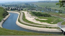 Open channels that carry water can be made with a new cement formulation that will purify the water via sun exposure as it flows toward its destination. Open channels that carry water can be made with a new cement formulation that will purify the water via sun exposure as it flows toward its destination.