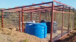 Two 1,250-gallon (5,000L) water storage tanks installed at an elevation of over 1,000 ft. (300 m). The tanks are fully chlorinated and emptied and refilled on a daily basis. Two 1,250-gallon (5,000L) water storage tanks installed at an elevation of over 1,000 ft. (300 m). The tanks are fully chlorinated and emptied and refilled on a daily basis.