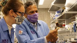 Researchers Vinayak Dravid and Stephanie Ribet examine their phosphate elimination and recovery substrate.