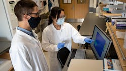 UBC researchers Nicolas Peleato and Li Ziyu examine the data after testing a water sample with a florescence spectrometer. UBC researchers Nicolas Peleato and Li Ziyu examine the data after testing a water sample with a florescence spectrometer.