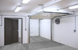 The wastewater building features two regular doors (one inside and one outside), as well as two overhead doors (one inside and one outside).
