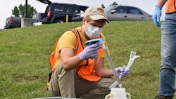 Eric Lundstrom, doctoral student in the Department of Epidemiology, takes a water sample with a pipette. Eric Lundstrom, doctoral student in the Department of Epidemiology, takes a water sample with a pipette.
