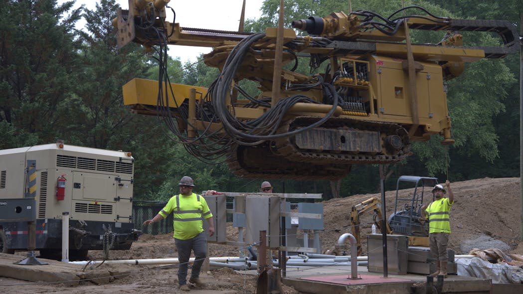 Prime contractor Lakeshore Engineering used a crane with rigging to lower the Beretta T46 Drilling Rig into the excavation as UMA&rsquo;s team provided direction.