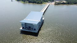 The new Intake Pump Station, built 1,000 feet from the shore in Lake Houston, will withdraw raw water from the lake and pump it to a newly constructed plant 1.5 miles away for treatment. The new Intake Pump Station, built 1,000 feet from the shore in Lake Houston, will withdraw raw water from the lake and pump it to a newly constructed plant 1.5 miles away for treatment.
