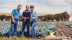 Mark Mason, a farm manager with Nature’s Reward; Michael Cahn, an irrigation advisor with University of California, Agriculture and Natural Resources; and Forrest Melton, an OpenET and NASA scientist, look at OpenET from a field in Salinas, California. Mark Mason, a farm manager with Nature’s Reward; Michael Cahn, an irrigation advisor with University of California, Agriculture and Natural Resources; and Forrest Melton, an OpenET and NASA scientist, look at OpenET from a field in Salinas, California.