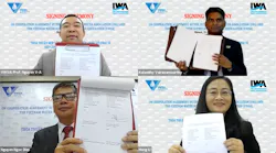 Officials signing the agreement between IWA and VSWA.
