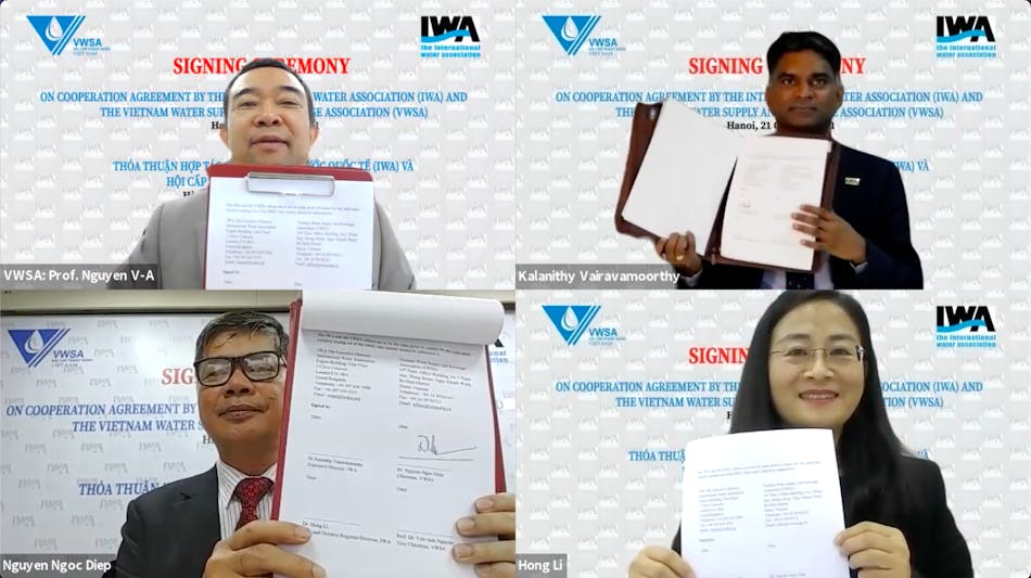 Officials signing the agreement between IWA and VSWA.