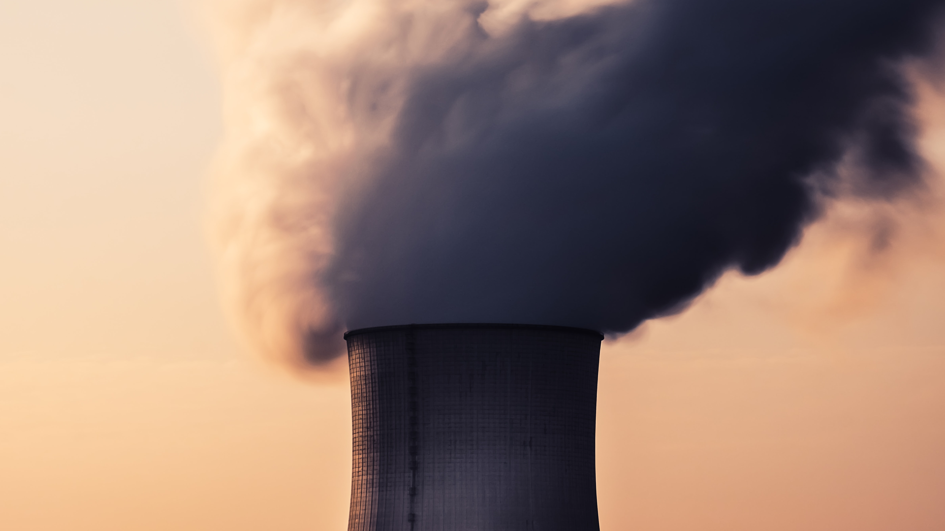 A cooling tower's fumes of a nuclear power plant in France.