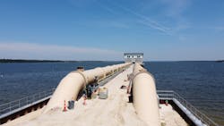 Two large raw water transmission mains are the start of a 1.5-mile-long conveyance system to the Northeast Water Purification Plant site. Two large raw water transmission mains are the start of a 1.5-mile-long conveyance system to the Northeast Water Purification Plant site.