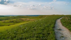 The Konza Prairie nature trail overlooking Manhattan, Kansas. The Konza Prairie nature trail overlooking Manhattan, Kansas.