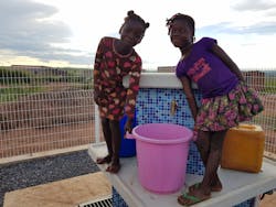 Clean drinking water now flows freely for the residents of Ombala yo Mungu, thanks to the new water treatment system. Clean drinking water now flows freely for the residents of Ombala yo Mungu, thanks to the new water treatment system.