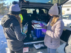 Caroline Jankowski (left), a Purdue graduate student in Environmental and Ecological Engineering, and Christian Ley, a University of Colorado Boulder postdoctoral associate and Purdue Environmental and Ecological Engineering alumna, test water samples collected from Colorado&rsquo;s Marshall Fire.